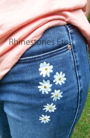 to turn plain jeans into stylish jeans with fabric paint and rhinestones - Rhinestones Etc