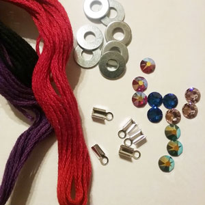 Supplies needed to make a rhinestone washer bracelet