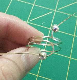 slide a crystal AB Rose Montee onto the wire ends for a diy ring