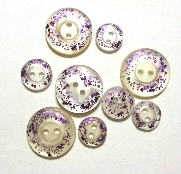 Glitter nail polish painted buttons