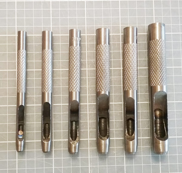Paper punch tools