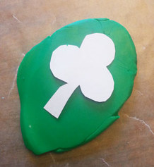 Cutting shamrock out of scupley clay