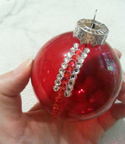 Gluing rhinestones to Christmas ornament