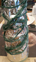 wrapping glue yarn around Christmas tree form
