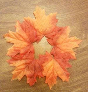 Arranging the leaves for your fall table centerpiece