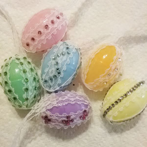 Plastic eggs with rhinestones for Easter door hanging