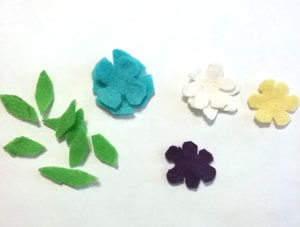 cutting out felt flowers for mother's day craft