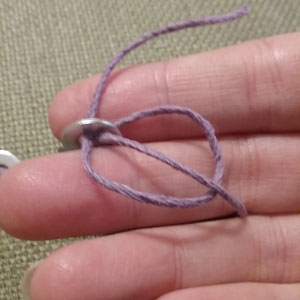 securing the ends of the hemp cord on the washer bracelet