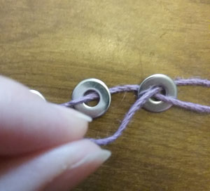 Threading the cord through the washers