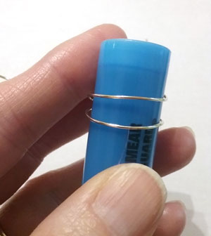 Wrap the wire around a highlighter to make a ring