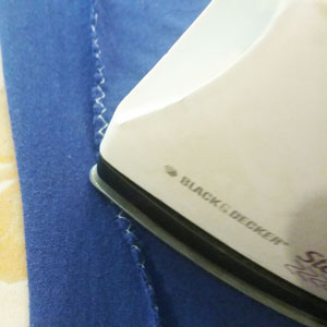 Pressing seams to outside edges of altered t shirt