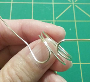 Bending the wire into loops for a diy ring