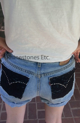 Rhinestone and metal silver metal stud embellished jeans