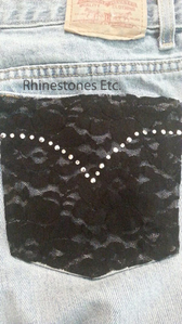 Rhinestone and silver metal stud embellished jean pocket