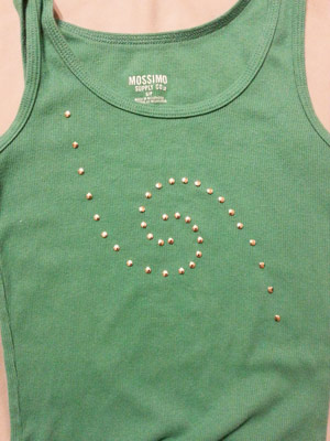 Laying out metal studs on tank top