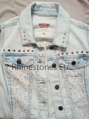 Denim vest embellished with nailheads and rose pins