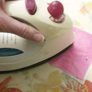 Using an iron to attach fusible facing