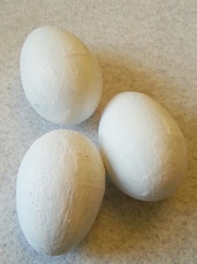Plastic eggs painted with Gesso