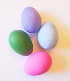 Plastic eggs painted with acrylic craft paint