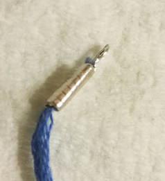 Attaching a cord end cap for washer necklace