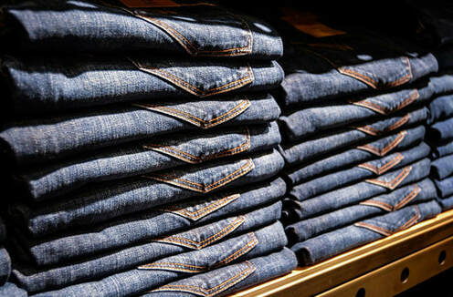 Stacks of denim jeans
